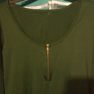 Long sleeve green body suit, with front zipper.